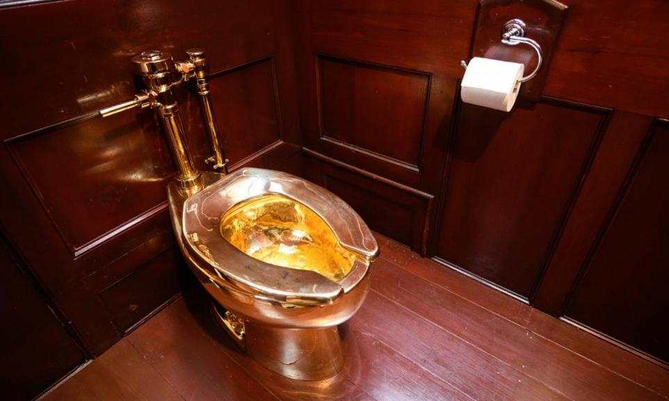 Golden toilet by Maurizio Cattelan (photo copyright Leon Neal/Getty Images)