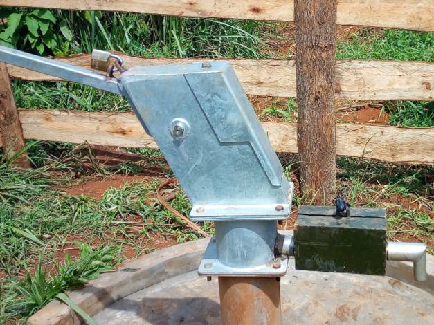 Lockable handle and water metre protected with box to provide security and control on Pay as you fetch borehole.