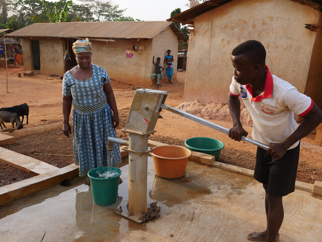 Janet Wilson collecting water close to her house in Agravi, Ghana