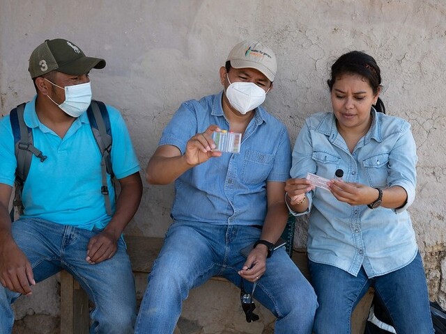 Technicians in Honduras checking water quality