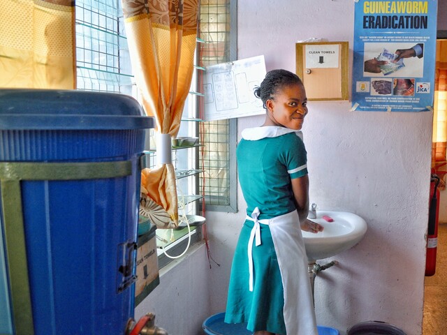 Girl washing hands in Ghana
