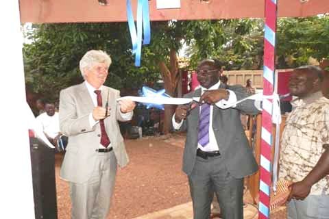 Director Nico Terra (left) and Sabné Koanda (Technical Advisor, Ministry of Agriculture and Water) open IRC's Burkina Faso Office. Photo: LeFaso.Net